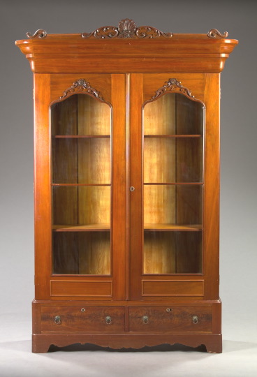 Appraisal: American Late Classical Walnut Bookcase mid- th century the shell-