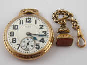 Appraisal: A gold plated open face pocket watch by Elgin USA