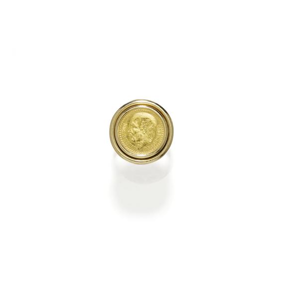 Appraisal: GOLD COIN RING ca Yellow gold g Casual-elegant ring the