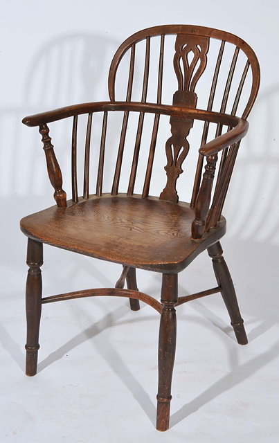 Appraisal: A TH CENTURY YEW AND ASH WINDSOR ARMCHAIR with splat