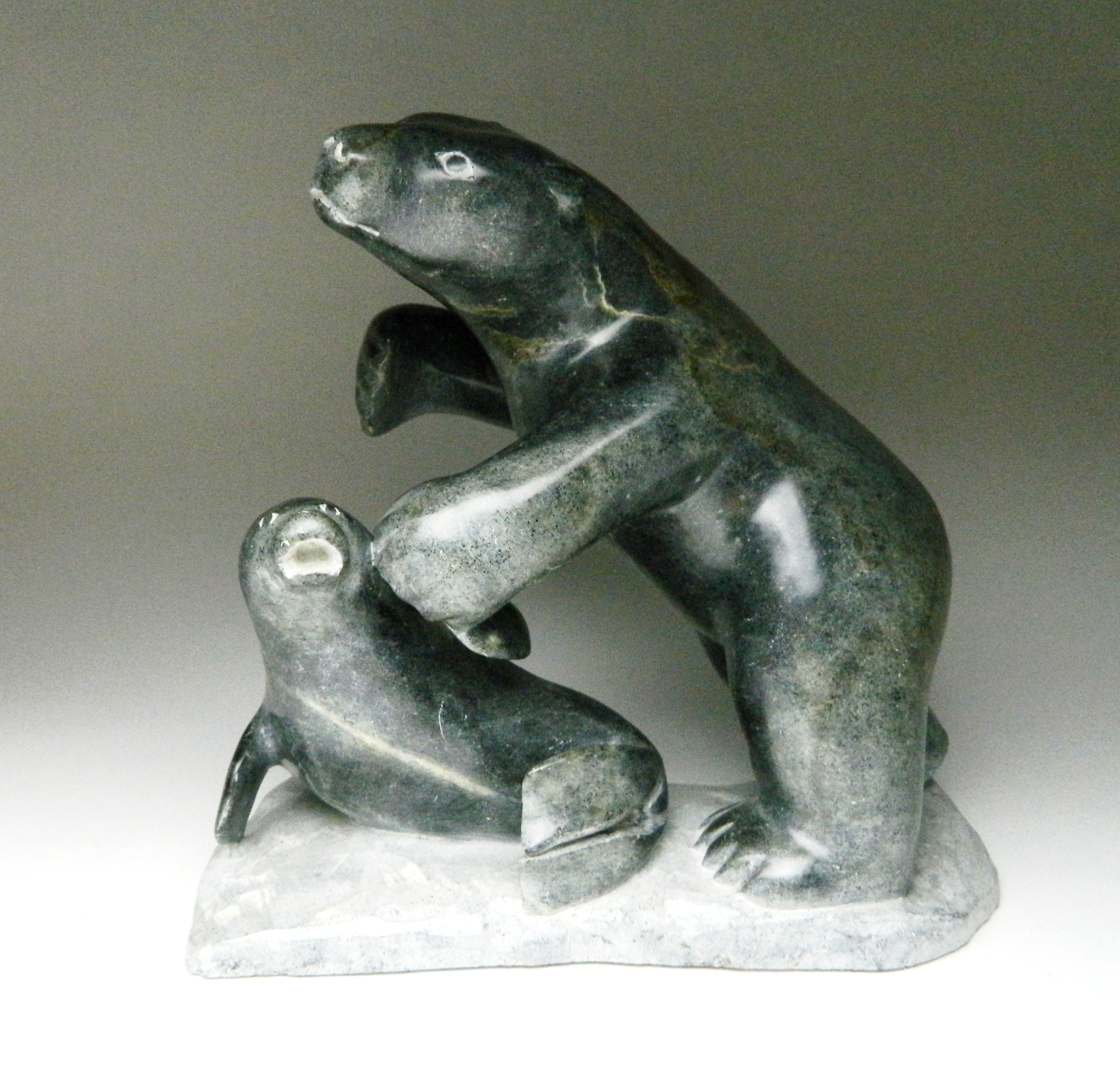 Appraisal: Simione Sivuarapik Povungnituk Bear and Seal- stone carving signed x