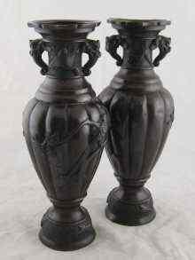 Appraisal: A pair of Japanese bronze vases probably Meiji period with