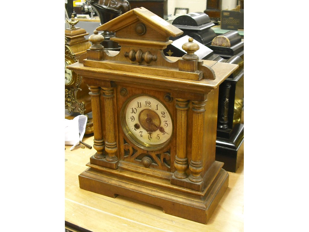 Appraisal: German two train mantel clock the cream dial within a