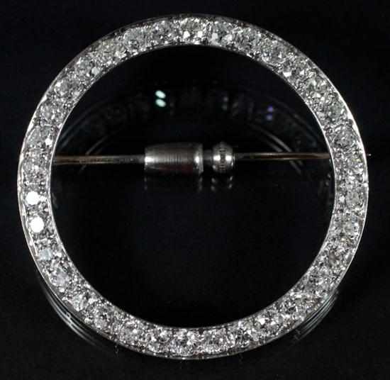 Appraisal: Art Deco unmarked white gold and diamond circle-form brooch Estimate