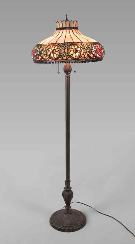 Appraisal: CONTEMPORARY STAINED GLASS FLOOR LAMP Cast metal base with floral