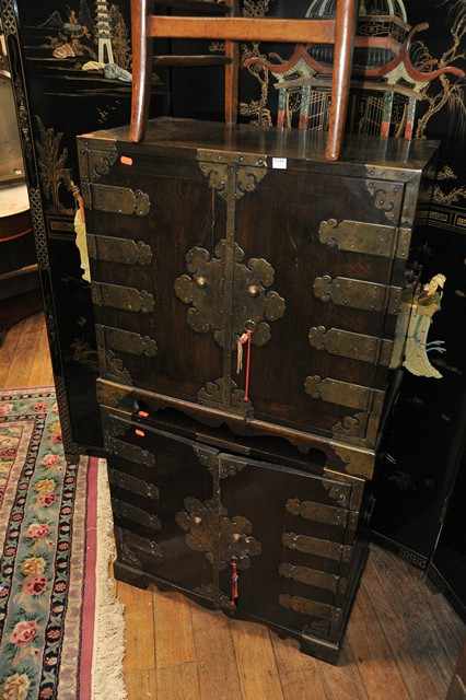 Appraisal: A PAIR OF ORIENTAL SIDE CABINETS WITH MULTIPLE DRAWERS AND