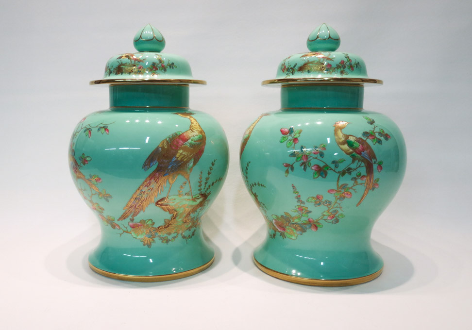 Appraisal: PAIR OF SPODE PORCELAIN LIDDED JARS with Oriental style peacocks