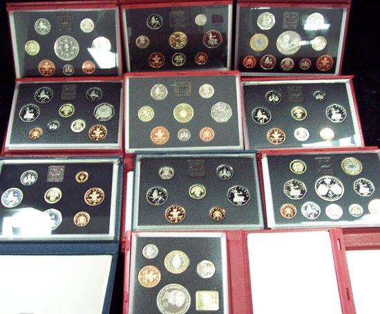 Appraisal: United Kingdom deluxe proof sets and UK proof sets and