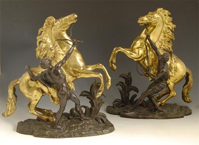 Appraisal: After Guillaume Cousteau French - A pair of bronze and