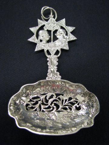 Appraisal: Dutch Sterling Silver Nut Spoon ornate courting scene with landscape