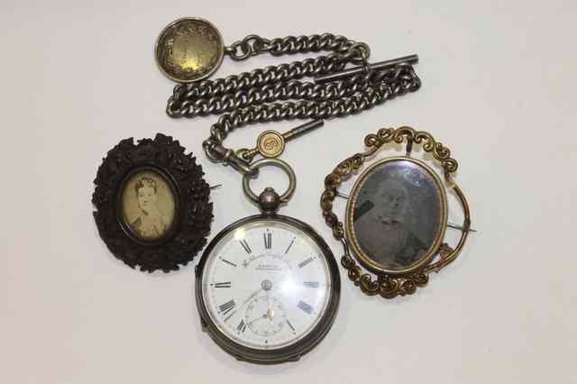 Appraisal: A SILVER POCKET WATCH with enamel dial and engine turned