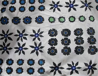 Appraisal: Poinsettia' Four Heal's printed cotton curtains designed by Lucienne Day