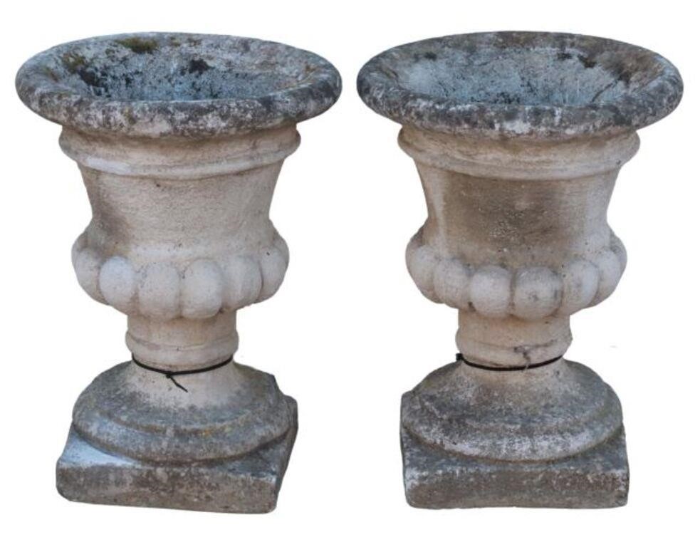 Appraisal: pair Cast stone garden urns having flared rim over melon