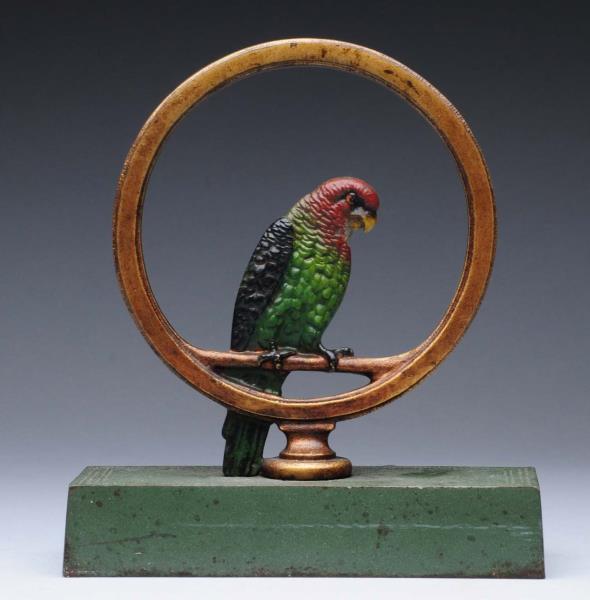 Appraisal: Cast Iron Parrot in Ring Doorstop Made by Bradley and