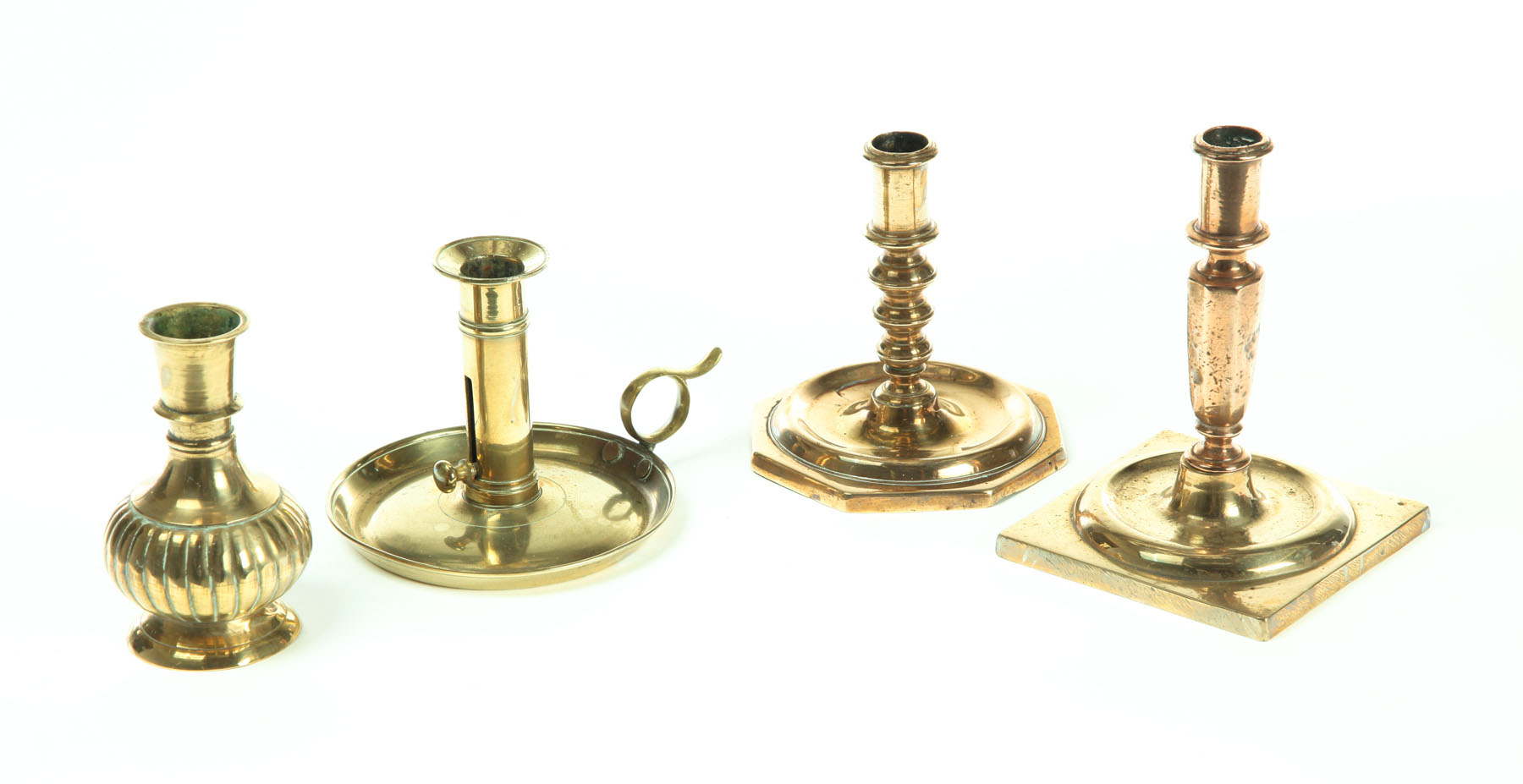 Appraisal: THREE BRASS CANDLESTICKS AND VASE European th century candlesticks Square