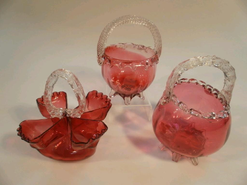 Appraisal: Three Cranberry glass baskets