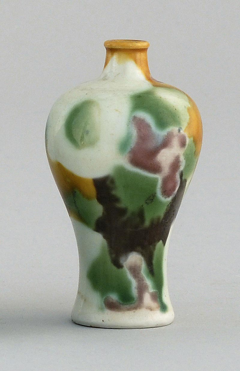 Appraisal: PORCELAIN MINIATURE VASE th CenturyIn meiping form with harlequin glaze