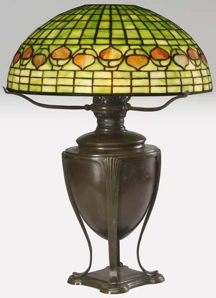 Appraisal: TIFFANY STUDIOS Table lamp with an Acorn pattern leaded glass