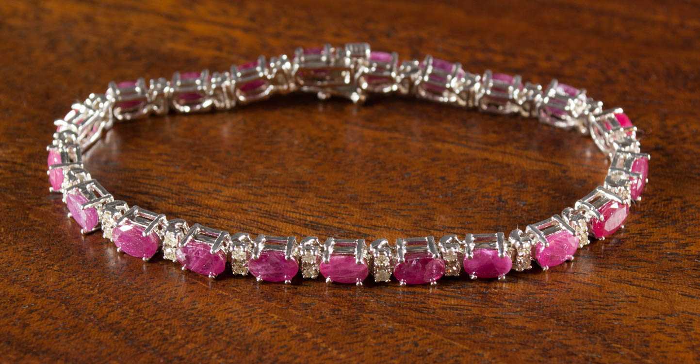 Appraisal: RUBY DIAMOND AND FOURTEEN KARAT GOLD BRACELET The white gold