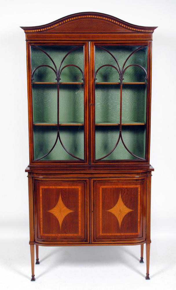 Appraisal: AN EDWARDIAN MAHOGANY DISPLAY CABINET crossbanded with stringing arched moulded