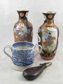 Appraisal: A pair of Japanese vases circa the complex vignettes and