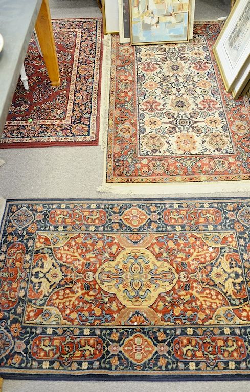 Appraisal: Four Oriental style throw rugs one is a Karastan '