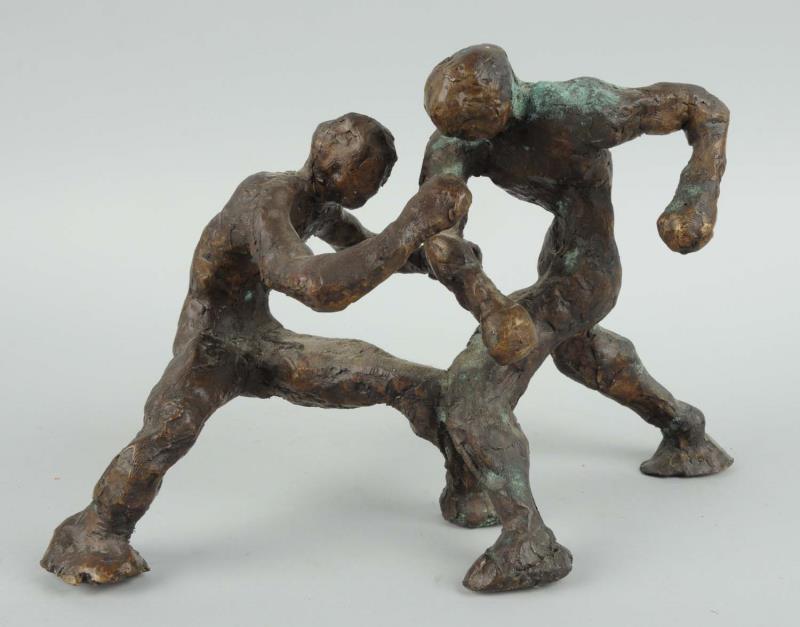 Appraisal: Bronze Wrestlers Sculpture The crudely done sculpture depicts two men