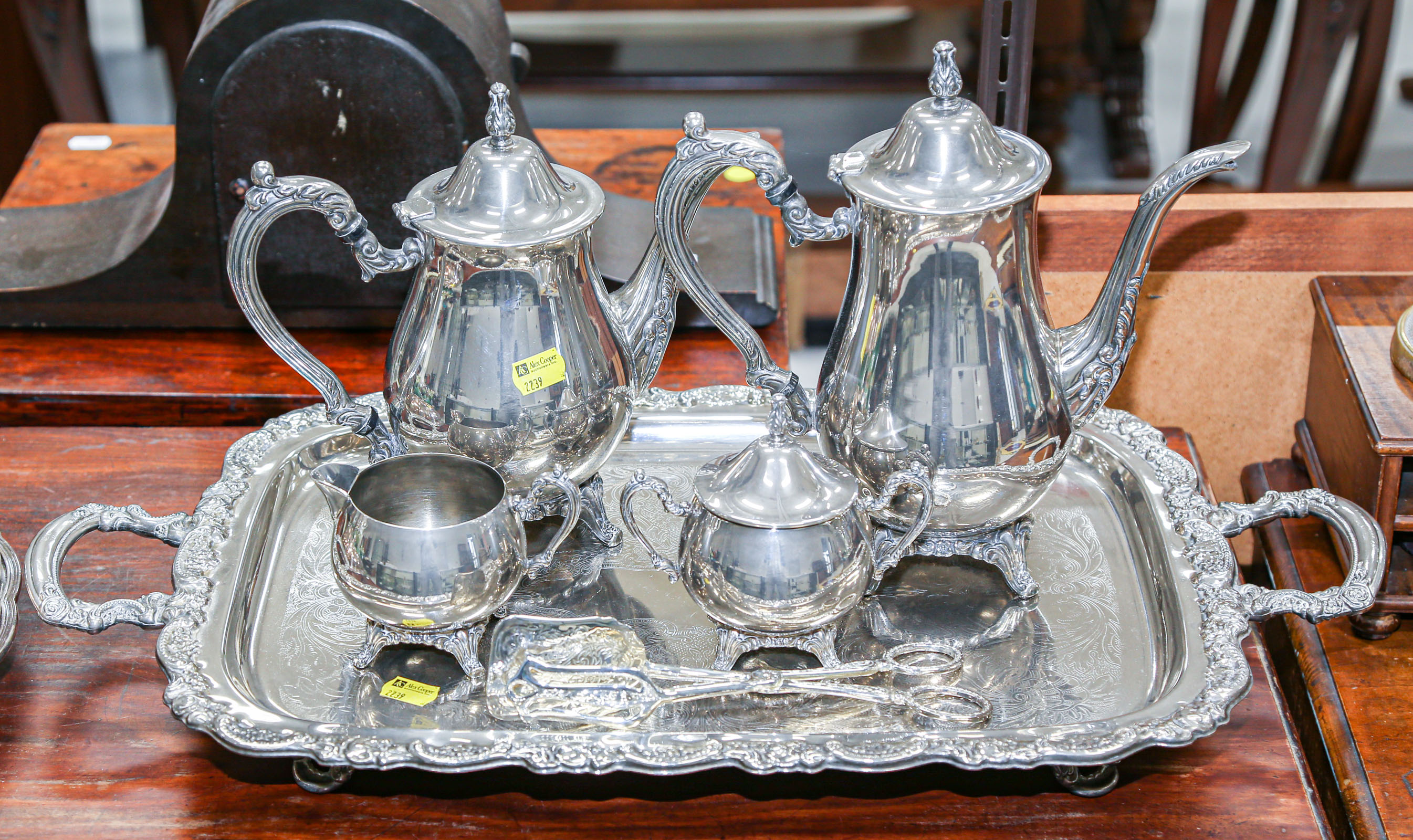 Appraisal: SILVER PLATED TEA SET WITH TRAY SERVING TONGS Made in