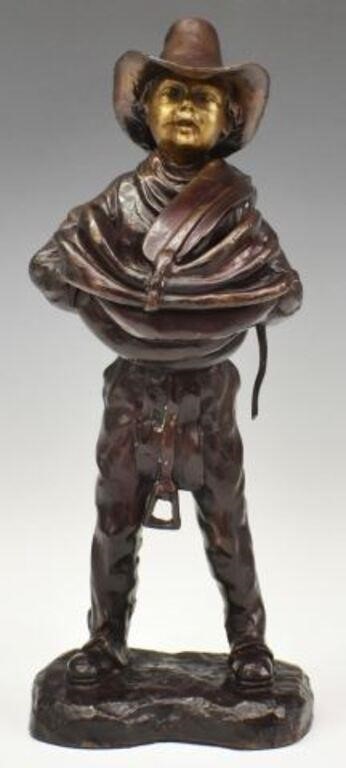 Appraisal: Patinated bronze sculpture Young Cowboy with Saddle unsigned approx h