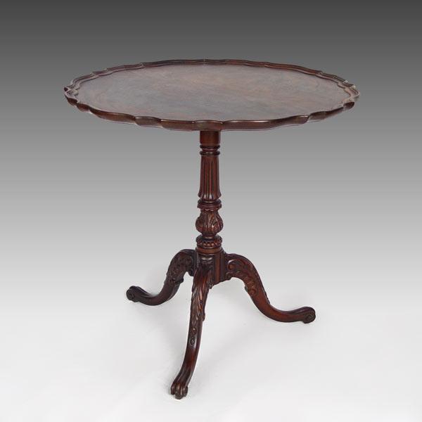 Appraisal: MAHOGANY PIE CRUST TILT TOP TEA TABLE Butterfly veneered top