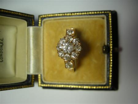 Appraisal: An early th century gold and diamond cluster ring the