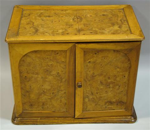 Appraisal: SMALL BURLED ELMWOOD STORAGE CHEST the rectangular hinged top with