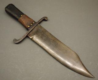 Appraisal: Bowie knife A Bowie knife Having a wire-wrapped wood handle