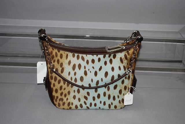 Appraisal: Judith Lieber brown handbag with animal skin blue sides and