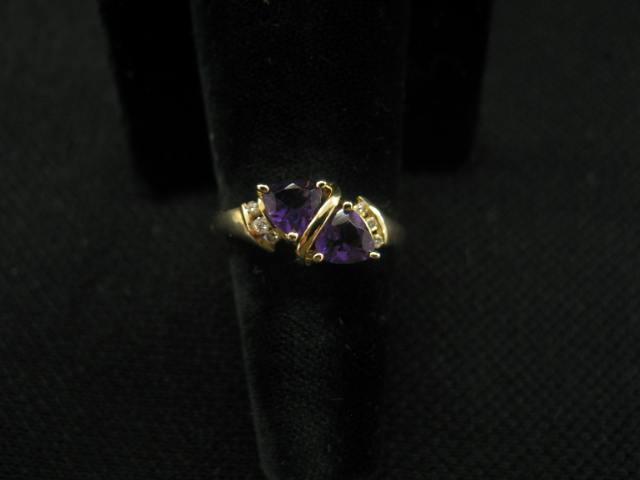 Appraisal: Amethyst Diamond Ring triangular gems highlighted by small diamonds in