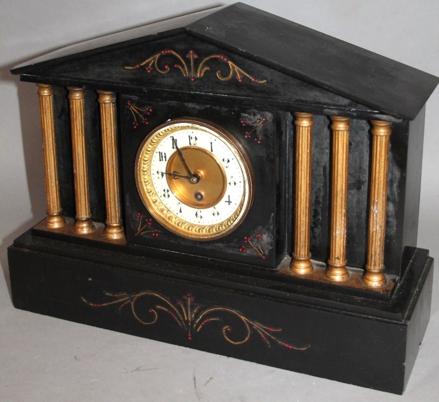 Appraisal: A thC slate mantel clock the cm Arabic dial flanked