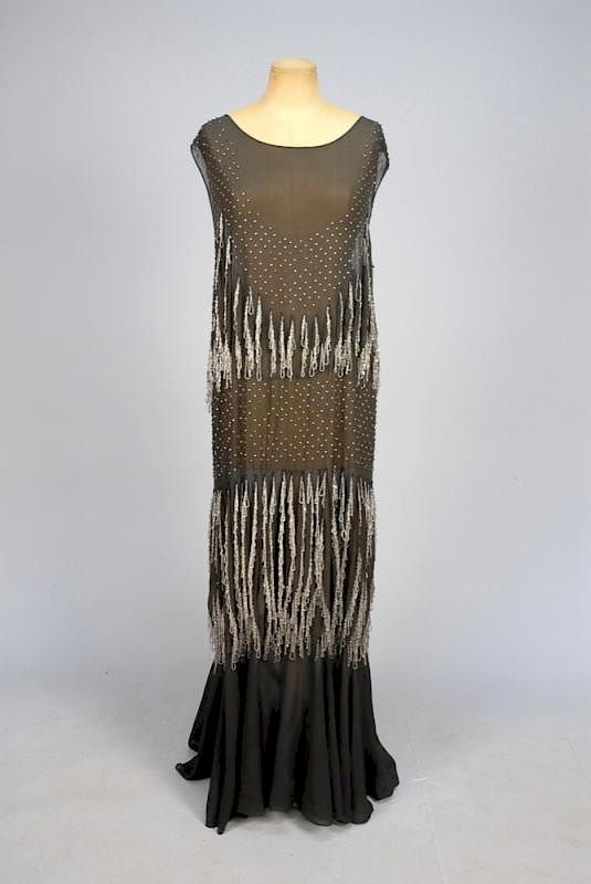 Appraisal: BEADED CHIFFON GOWN with RHINESTONES s Sleeveless black rayon having