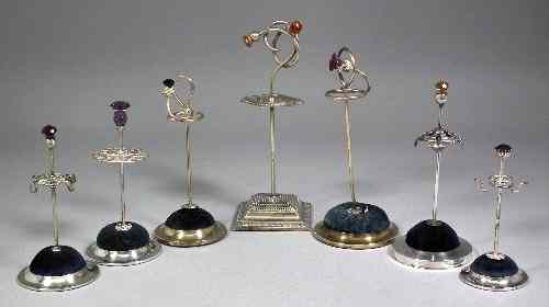 Appraisal: An early th Century silver plated base hat pin stand