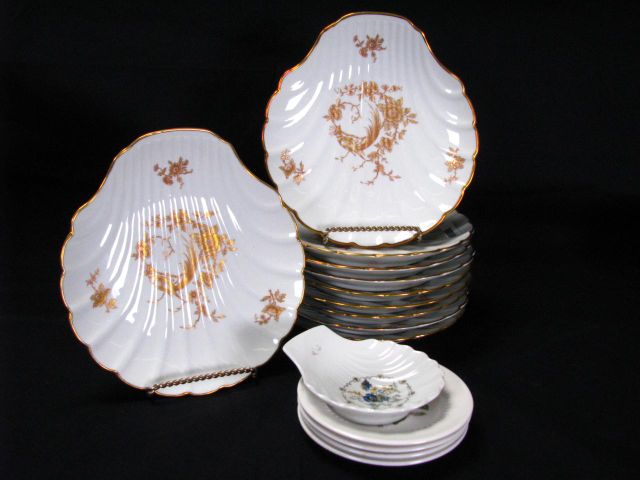 Appraisal: Ten shell motif Limoges plates one shell motif Limoges spoon