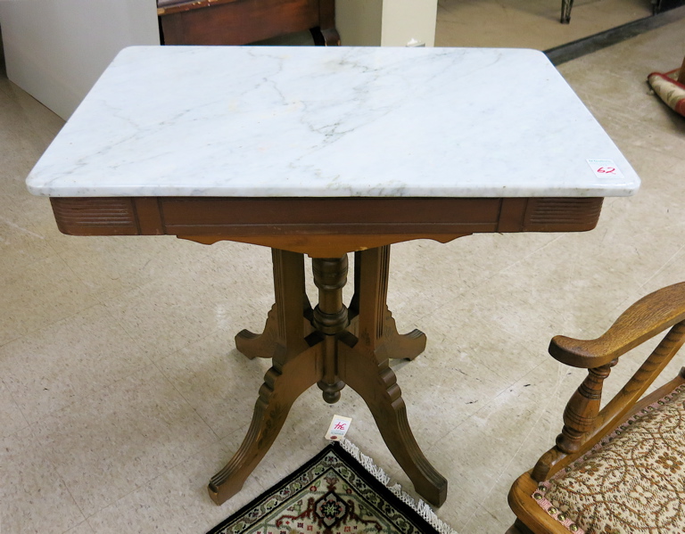 Appraisal: A VICTORIAN MARBLE-TOP LAMP TABLE Eastlake style American c having