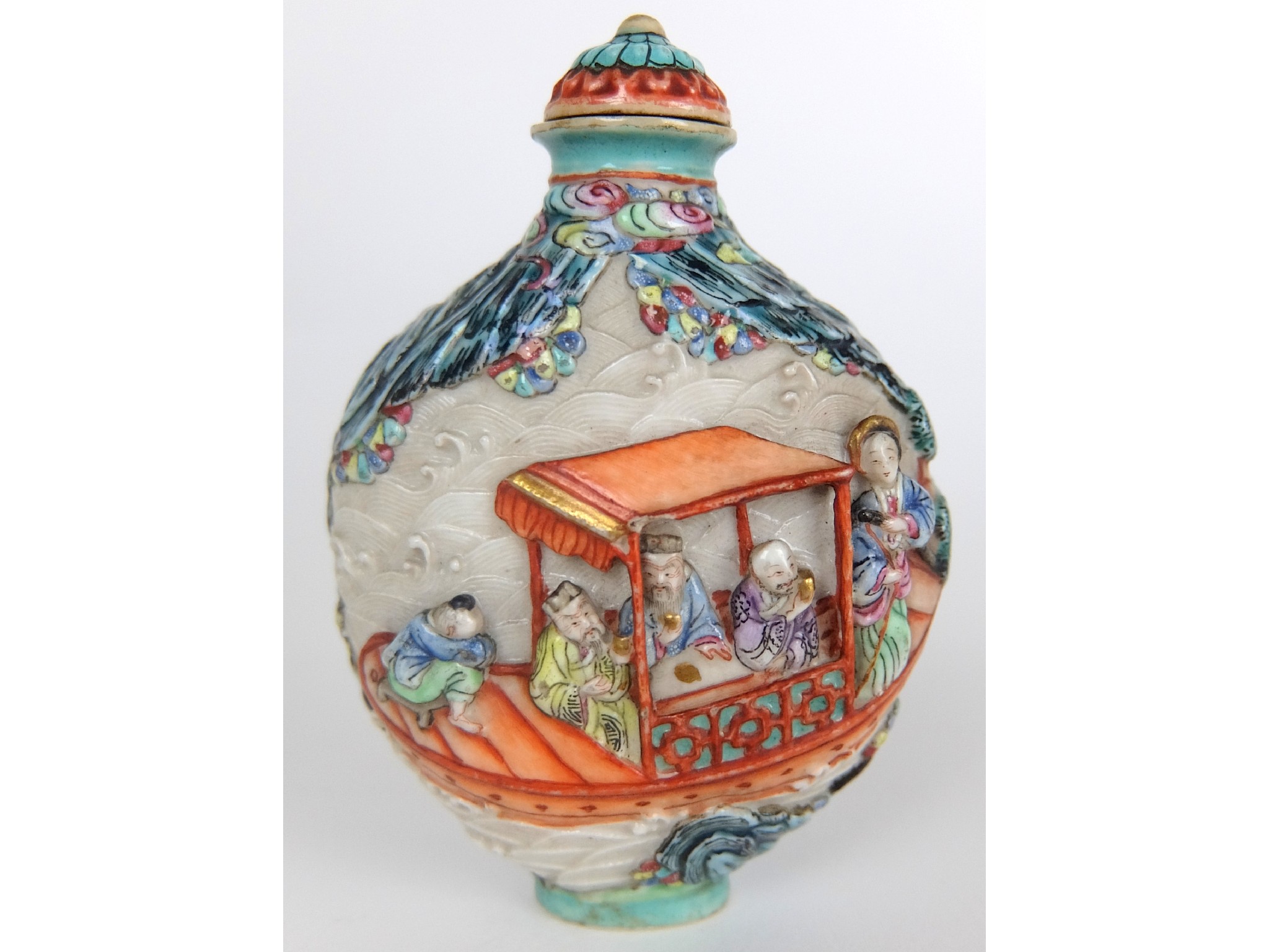 Appraisal: A Chinese porcelain relief moulded snuff bottledecorated to one side