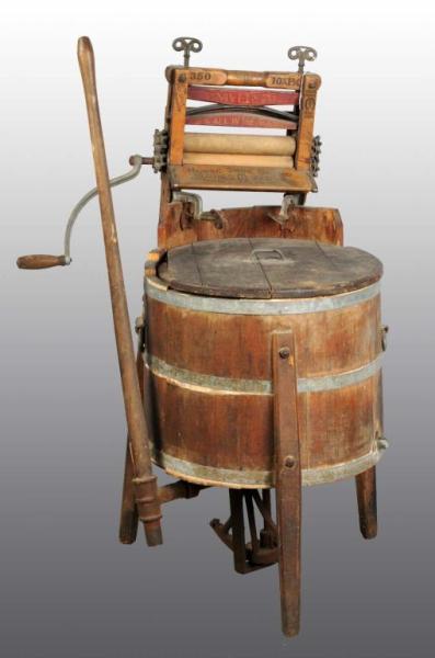 Appraisal: Early Wooden Washing Machine with Wringer Description Comes with Universal