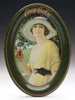 Appraisal: COCA-COLA TIP TRAY Illustration of woman in yellow outfit on