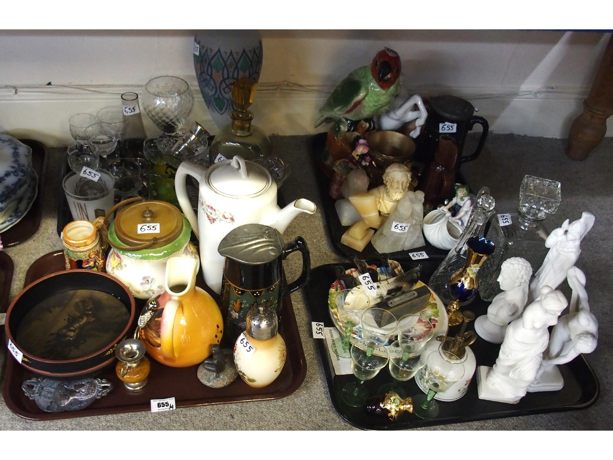 Appraisal: Four trays comprising various glass vessels four porcelain classical figures