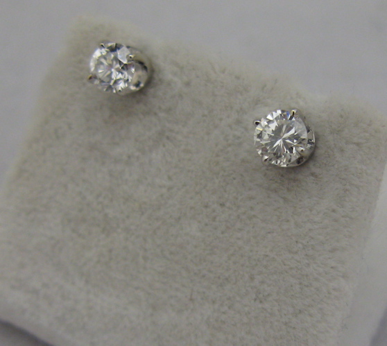 Appraisal: PAIR OF DIAMOND AND KARAT WHITE GOLD EAR STUDS each