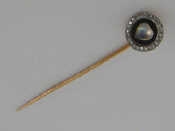 Appraisal: CARTIER an Art Deco diamond enamel and moonstone stick pin