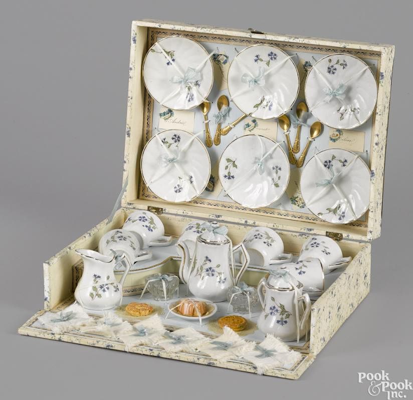 Appraisal: French doll's tea service in a presentation box complete with