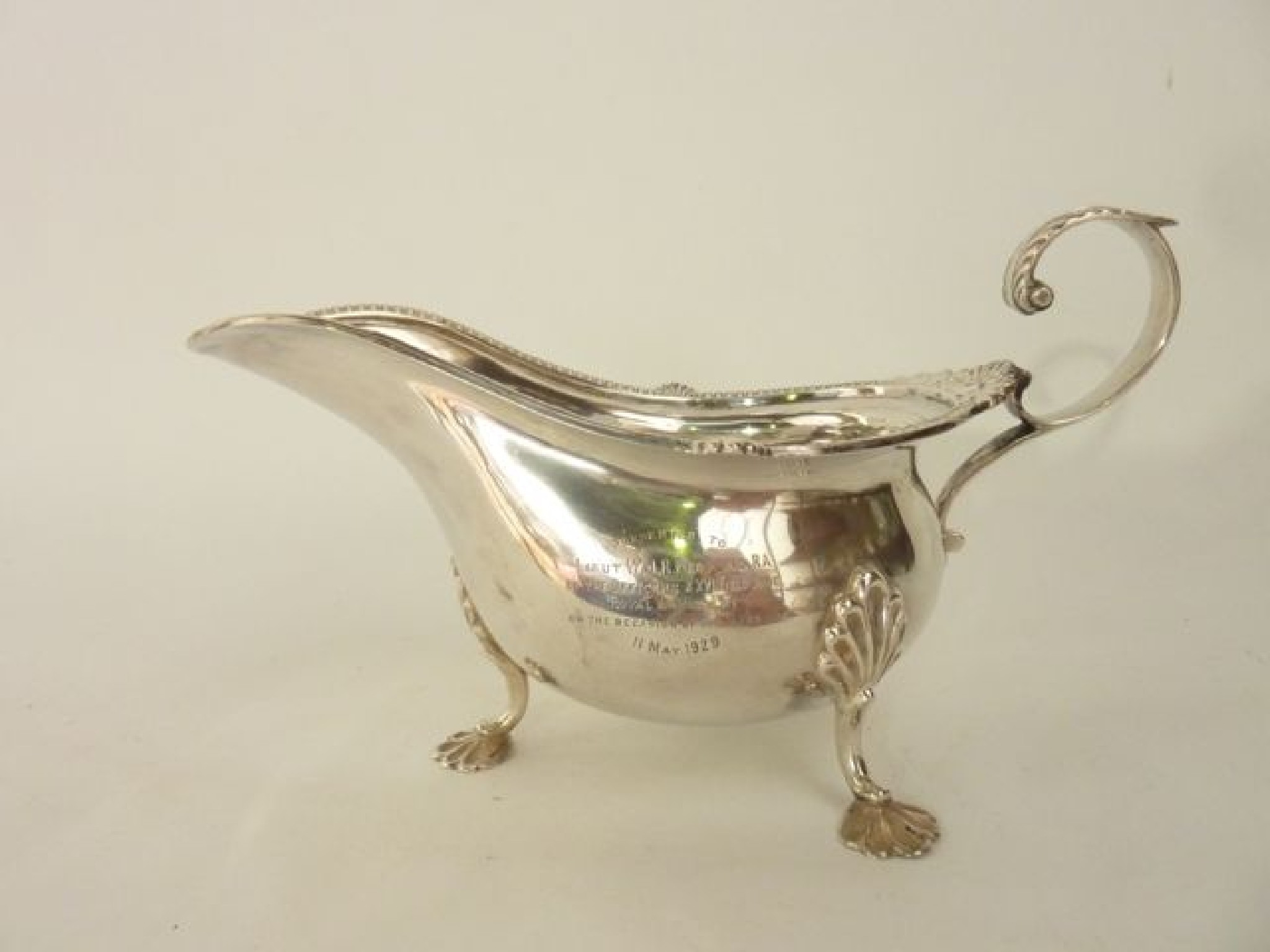 Appraisal: A George V silver sauce boat Walker Hall Sheffield the