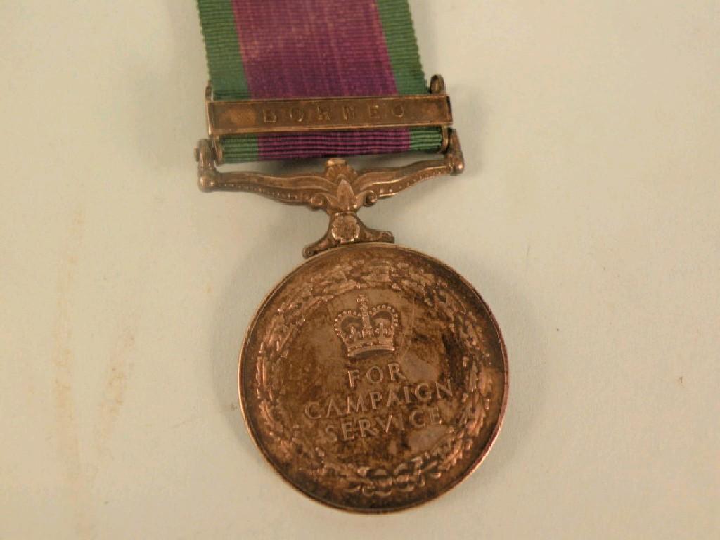 Appraisal: An Elizabeth II Campaign Service Medal presented to a Trapper