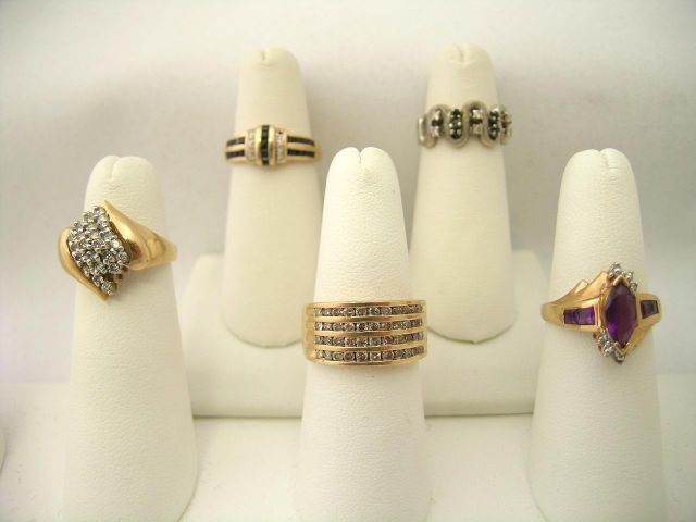 Appraisal: Group of five gold gemstone rings including K white gold